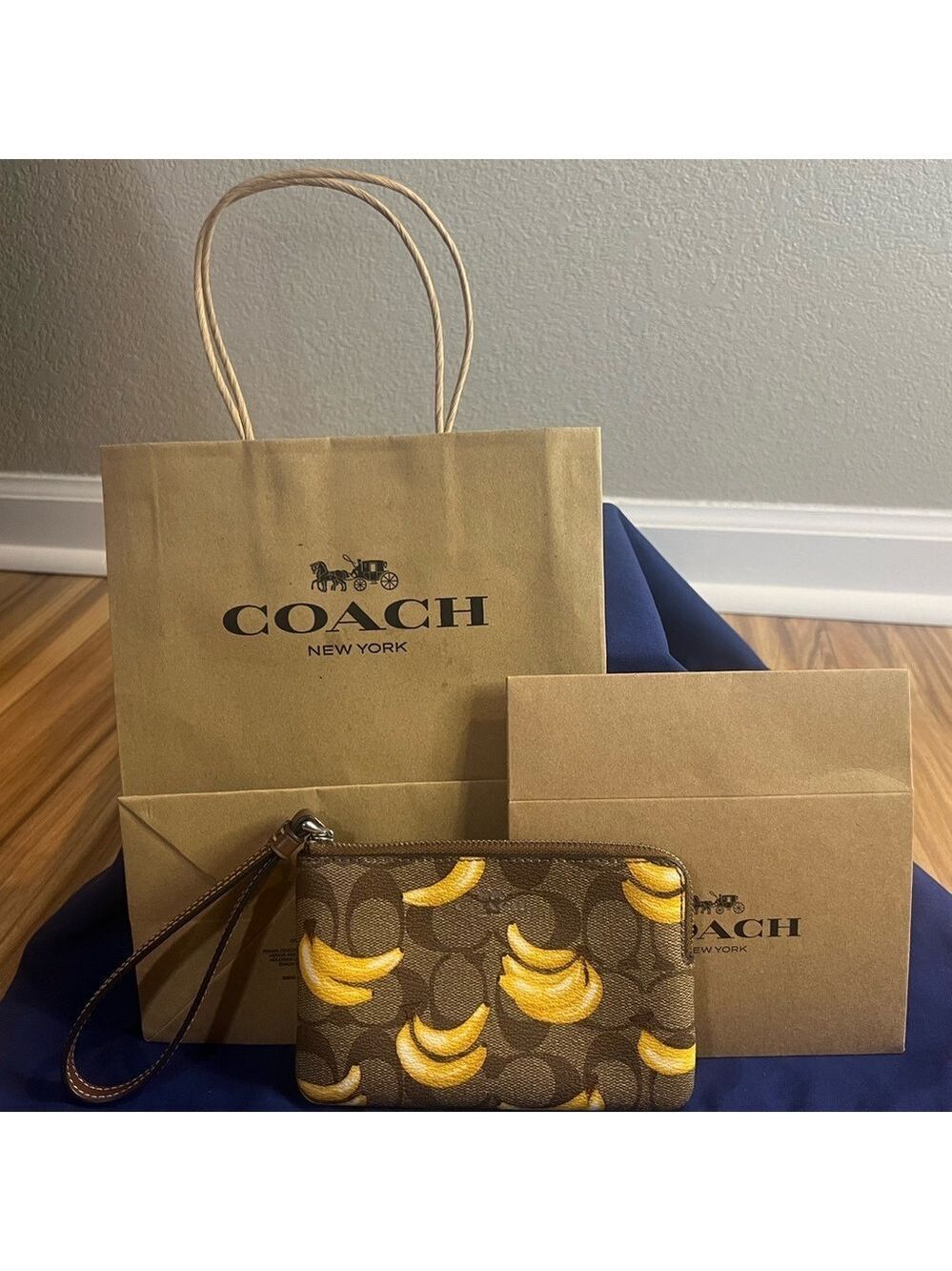 Coach BANANAS Wristlet with box and bag NWOT
